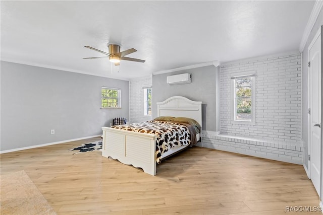 bedroom with light hardwood / wood-style flooring, ceiling fan, ornamental molding, brick wall, and an AC wall unit