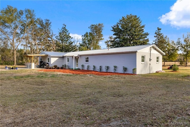 single story home featuring a front yard