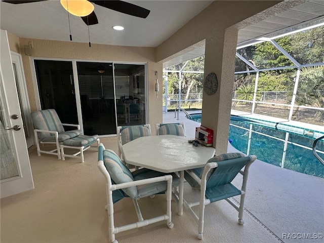 sunroom / solarium with ceiling fan