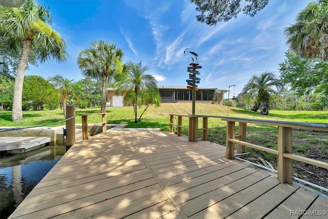 10741 W Pine Bark Ln, Crystal River, FL 34429 - dock area featuring a yard and a deck