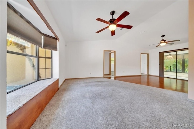 10741 W Pine Bark Ln, Crystal River, FL 34429 - empty room featuring vaulted ceiling, carpet, and ceiling fan