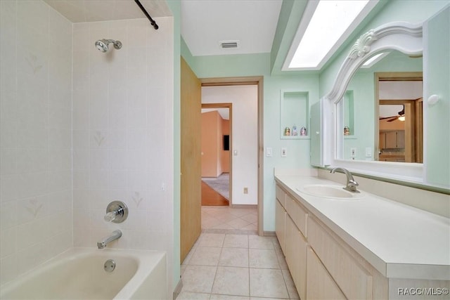 10741 W Pine Bark Ln, Crystal River, FL 34429 - full bath with tub / shower combination, tile patterned floors, and vanity