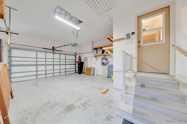 10741 W Pine Bark Ln, Crystal River, FL 34429 - garage featuring a garage door opener