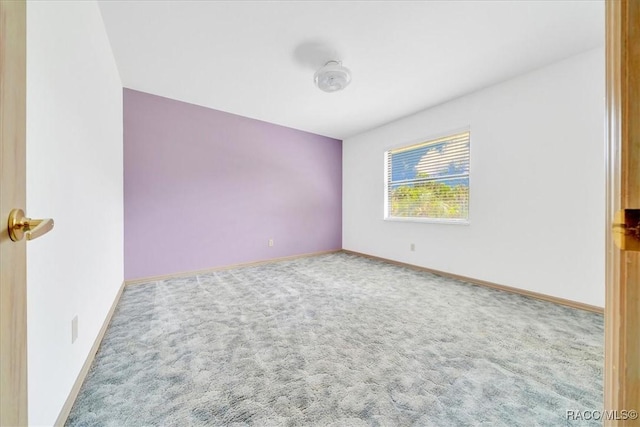10741 W Pine Bark Ln, Crystal River, FL 34429 - spare room with carpet flooring and baseboards
