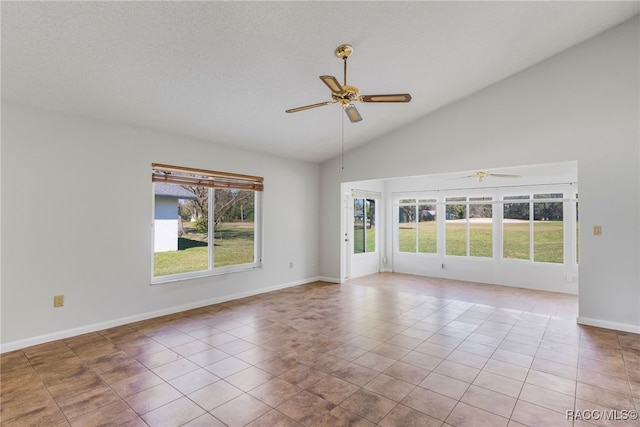 unfurnished room with baseboards, a ceiling fan, tile patterned flooring, a textured ceiling, and high vaulted ceiling