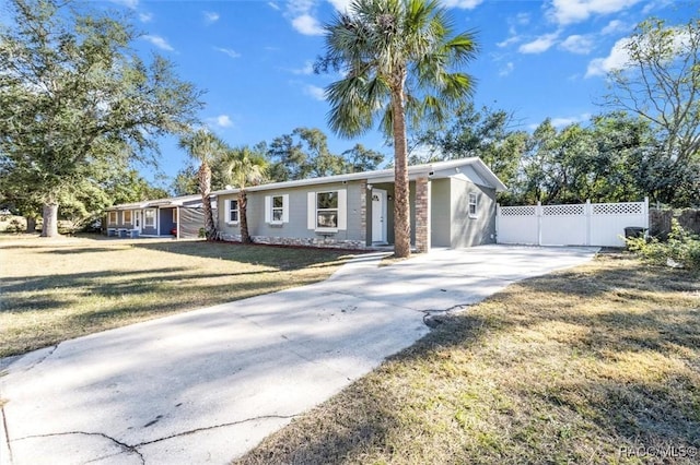 ranch-style house with a front yard