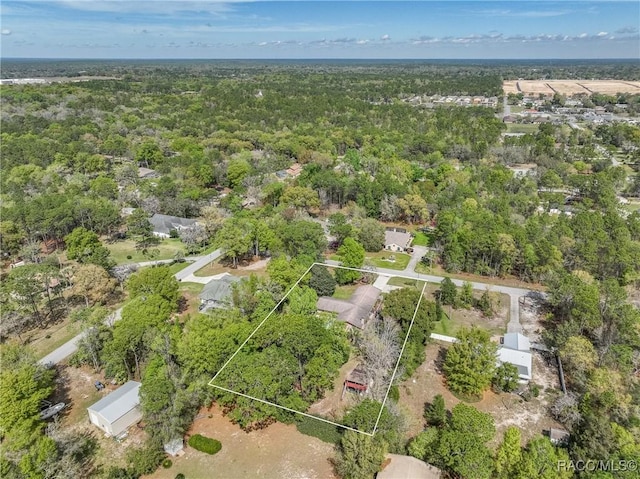 aerial view featuring a forest view