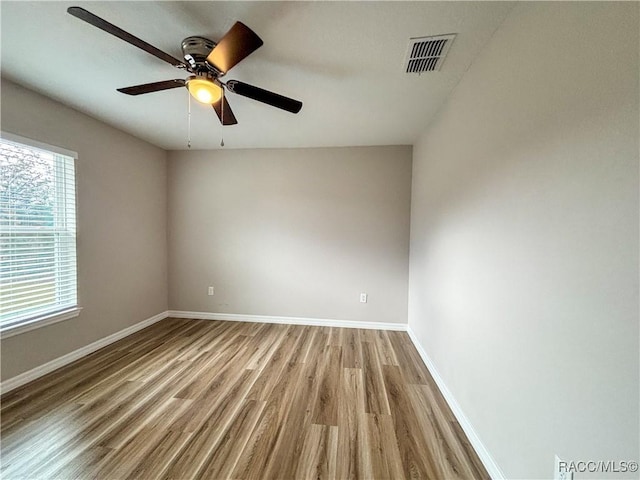 6431 SW 145th Ln, Ocala, FL 34473 - unfurnished room with light wood finished floors and a ceiling fan