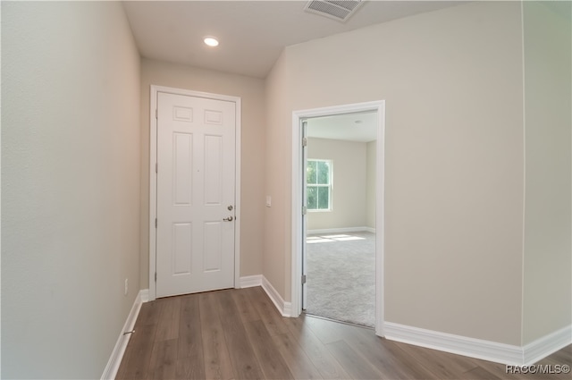 hall featuring wood-type flooring