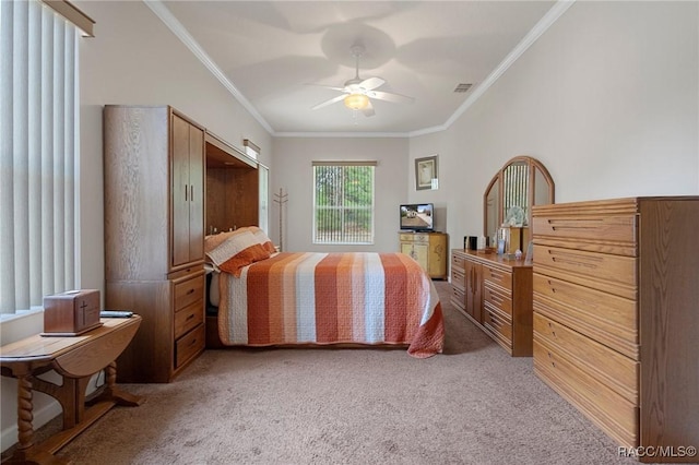 bedroom featuring ceiling fan, light colored carpet, and ornamental molding