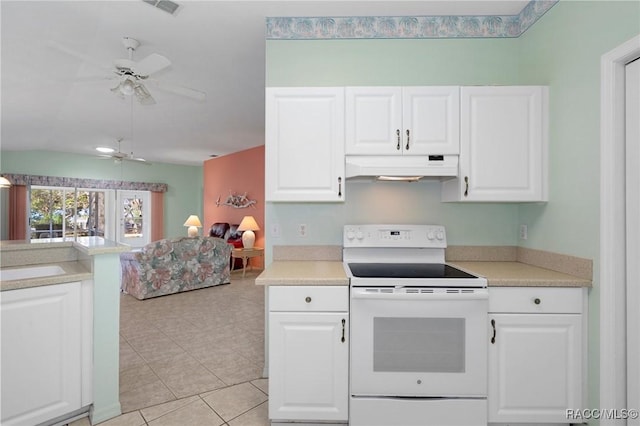 kitchen with light tile patterned floors, white range with electric stovetop, white cabinetry, and ceiling fan