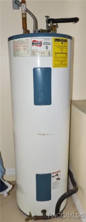 utility room with electric water heater