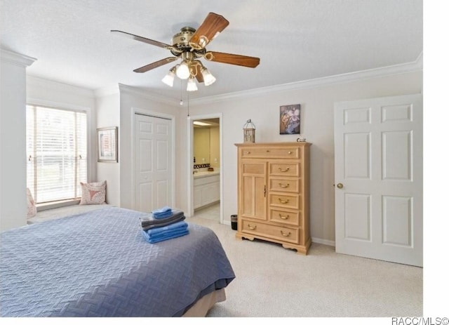 bedroom featuring ornamental molding, light colored carpet, ceiling fan, and a closet