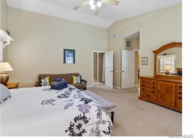 bedroom featuring high vaulted ceiling, light colored carpet, and ceiling fan