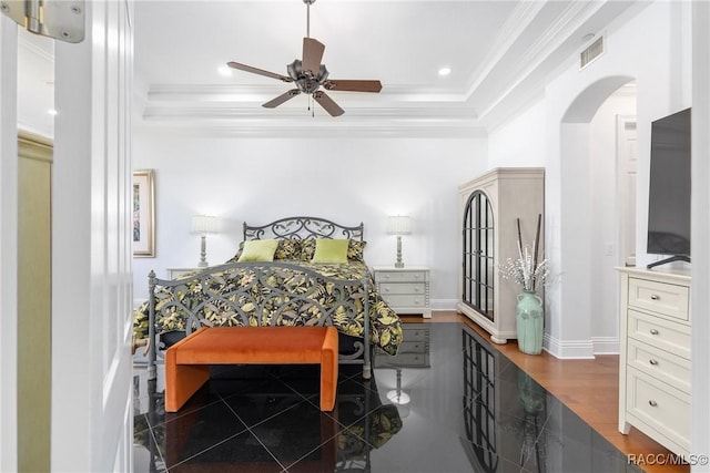 1147 W Pointe Vista Path Unit C1, Hernando, FL 34442 - bedroom featuring arched walkways, a raised ceiling, crown molding, recessed lighting, and ceiling fan