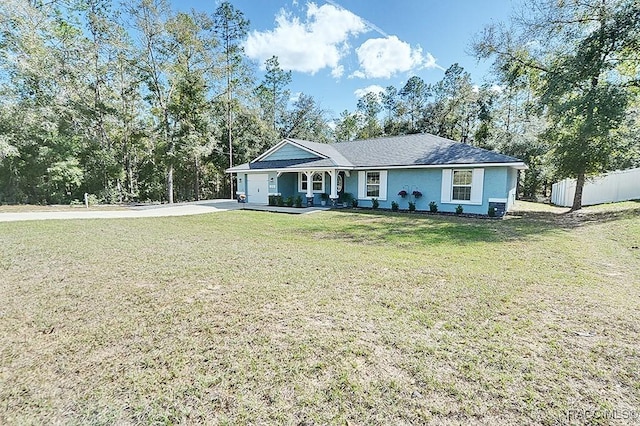 single story home with a front yard