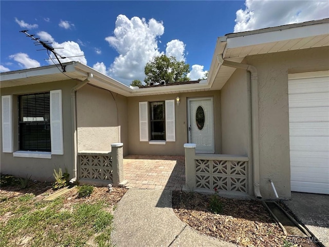 2510 W Dolphin Dr, Citrus Springs, FL 34434 - view of exterior entry with stucco siding