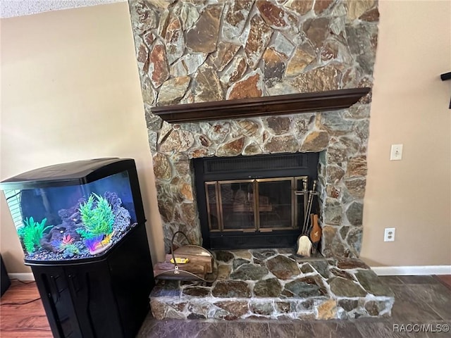 2510 W Dolphin Dr, Citrus Springs, FL 34434 - detailed view of baseboards and a fireplace