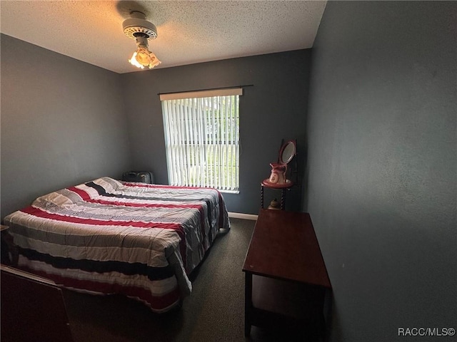 2510 W Dolphin Dr, Citrus Springs, FL 34434 - bedroom featuring carpet floors and a textured ceiling