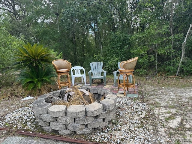 2510 W Dolphin Dr, Citrus Springs, FL 34434 - view of patio / terrace featuring a fire pit
