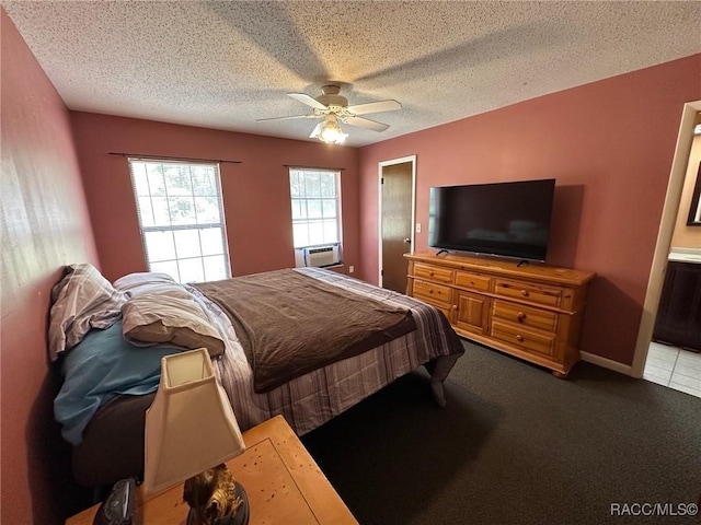 2510 W Dolphin Dr, Citrus Springs, FL 34434 - carpeted bedroom featuring a textured ceiling, a ceiling fan, and an AC wall unit