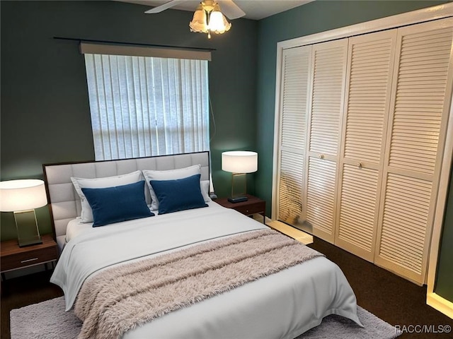 2510 W Dolphin Dr, Citrus Springs, FL 34434 - bedroom featuring a closet, a ceiling fan, and dark colored carpet
