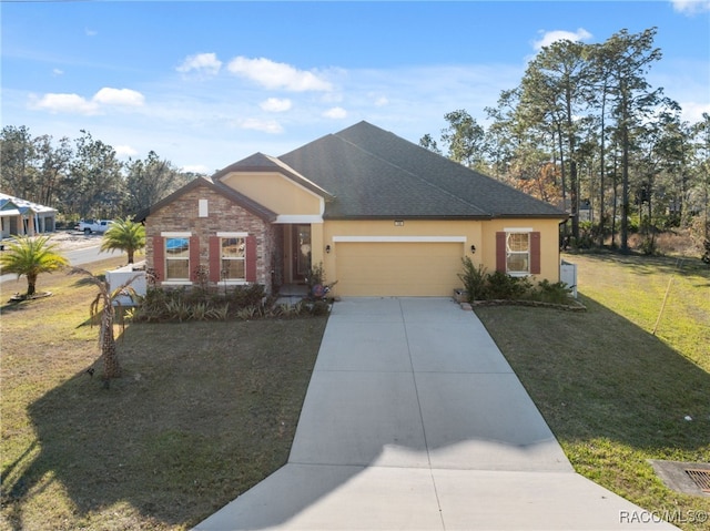 view of front of property with a front lawn and a garage