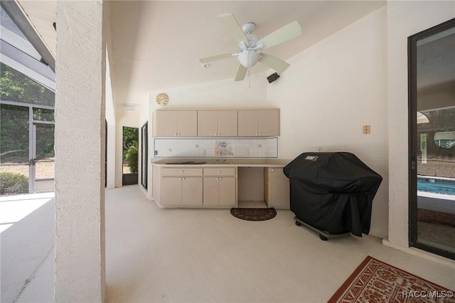view of patio featuring a ceiling fan, a lanai, and a grill