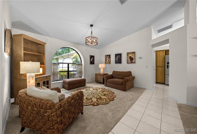 living room with lofted ceiling, an inviting chandelier, visible vents, light carpet, and baseboards