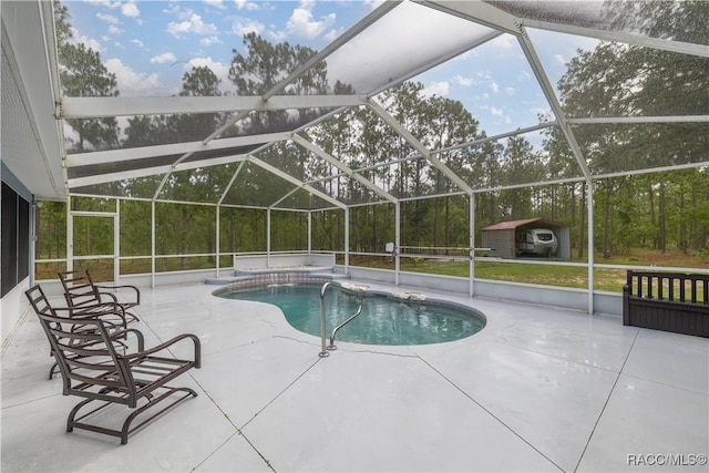 11271 SE 136th Ter, Dunnellon, FL 34431 - outdoor pool featuring a patio and a storage shed