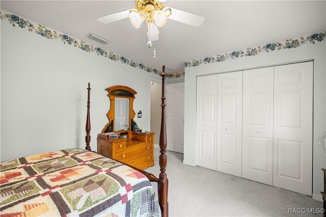 11271 SE 136th Ter, Dunnellon, FL 34431 - bedroom featuring light colored carpet, a closet, and ceiling fan