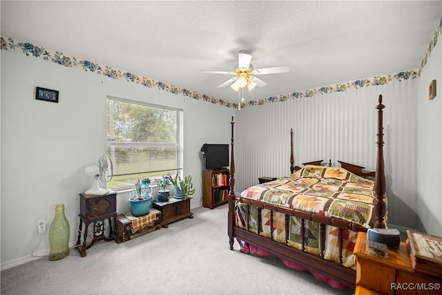 11271 SE 136th Ter, Dunnellon, FL 34431 - carpeted bedroom with ceiling fan and baseboards