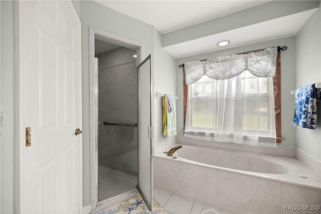 11271 SE 136th Ter, Dunnellon, FL 34431 - bathroom with a garden tub, tile patterned floors, and a walk in shower