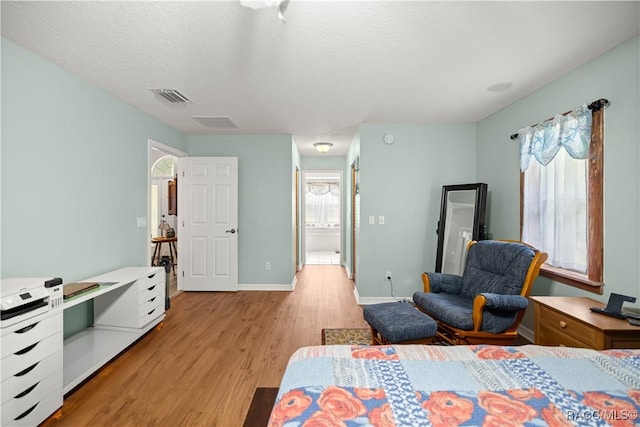 11271 SE 136th Ter, Dunnellon, FL 34431 - bedroom with light wood finished floors and baseboards