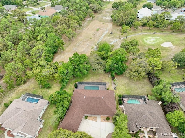 birds eye view of property with a residential view