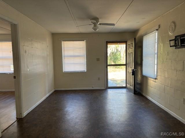 empty room featuring ceiling fan