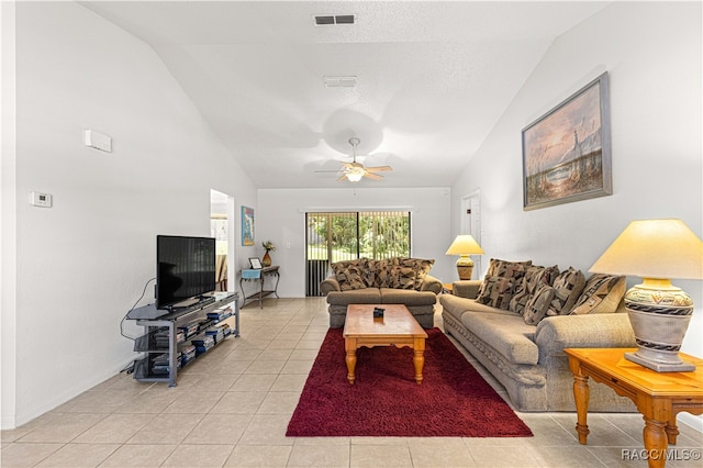 living room with light tile patterned floors, vaulted ceiling, and ceiling fan