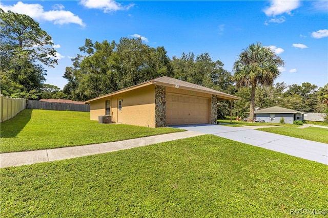 ranch-style house featuring a front lawn and cooling unit