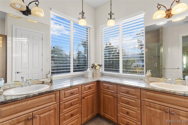 bathroom with vanity and an enclosed shower