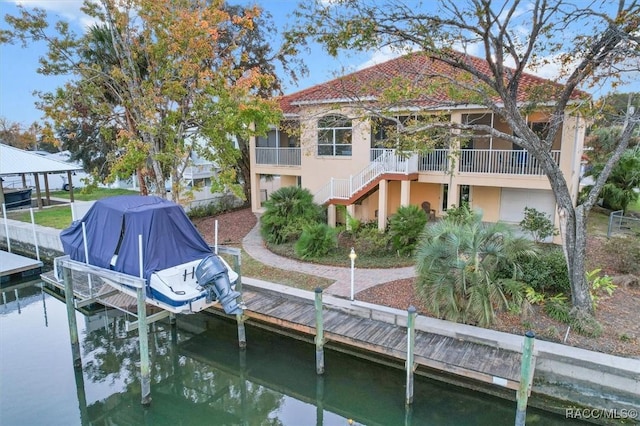 exterior space with a water view