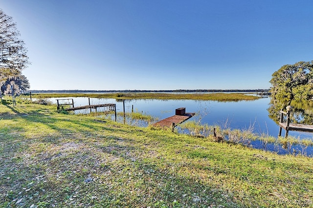 view of dock with a water view