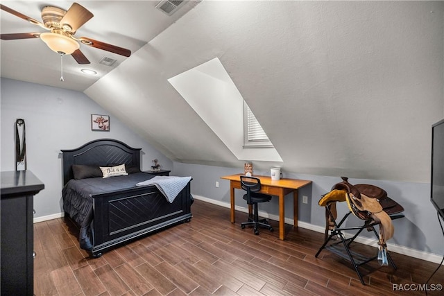 bedroom with wood finish floors, visible vents, and baseboards