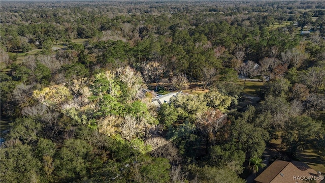 aerial view featuring a forest view