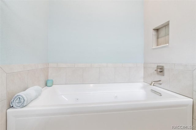 bathroom featuring a garden tub