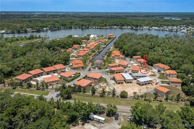 10234 W Middleburg Loop Unit 152, Homosassa, FL 34448 - aerial perspective of suburban area with a large body of water and a heavily wooded area