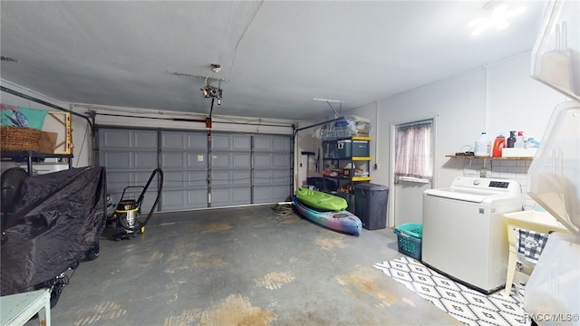 garage featuring washer / clothes dryer