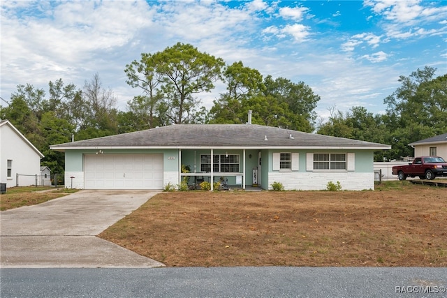 ranch-style home featuring a garage