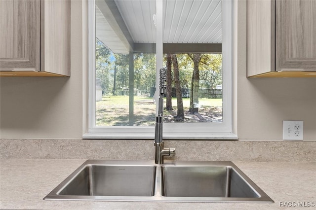 kitchen featuring sink and light brown cabinets