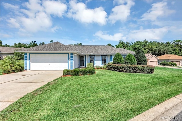 single story home featuring a garage and a front yard