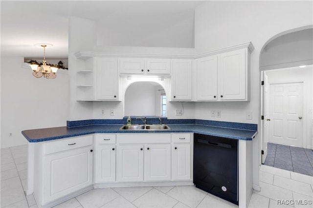 kitchen with a notable chandelier, sink, white cabinetry, and black dishwasher